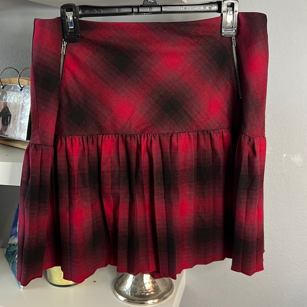Pleated red and black skirt